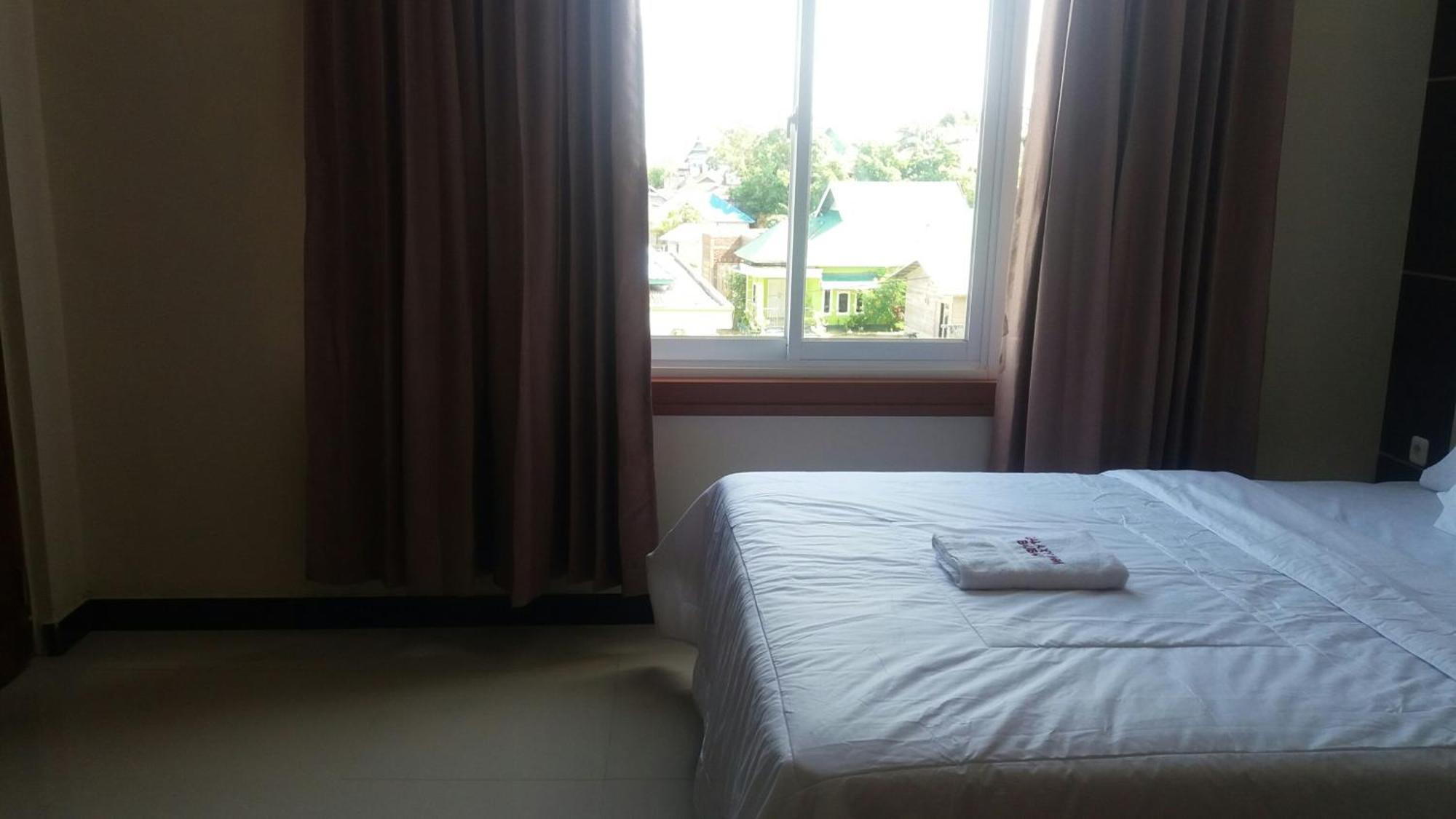 Galaxy Inn Baubau Bagian luar foto