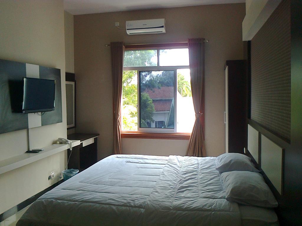 Galaxy Inn Baubau Bagian luar foto