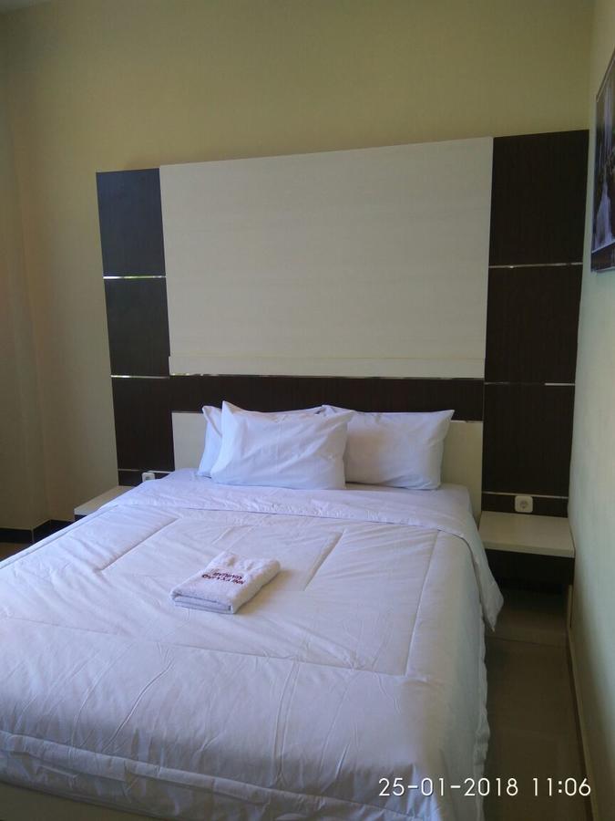 Galaxy Inn Baubau Bagian luar foto